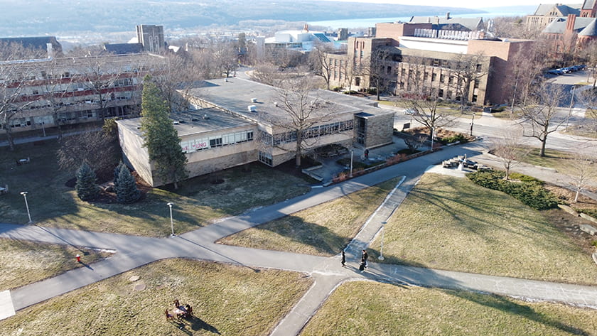 Aerial photograph of the Pew Engineering Quad, with Cayuga Lake in the distance.