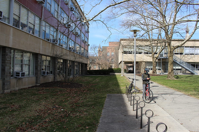 A photograph of Carpenter Hall in the distance that shows Hollister Hall on the left hand side