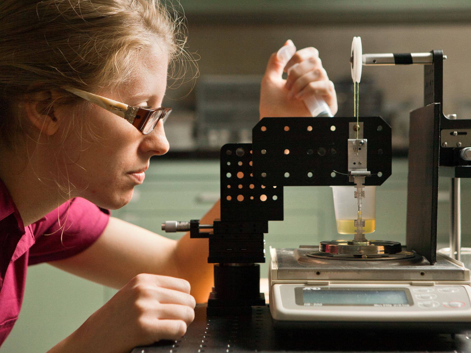 Photograph of a chemical engineering student in the lab