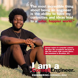 A photograph of the I am a Cornell Engineer poster with Jensen on it.